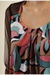 Top en manches transparentes