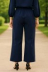 Pantalon fluide avec bandes blanches